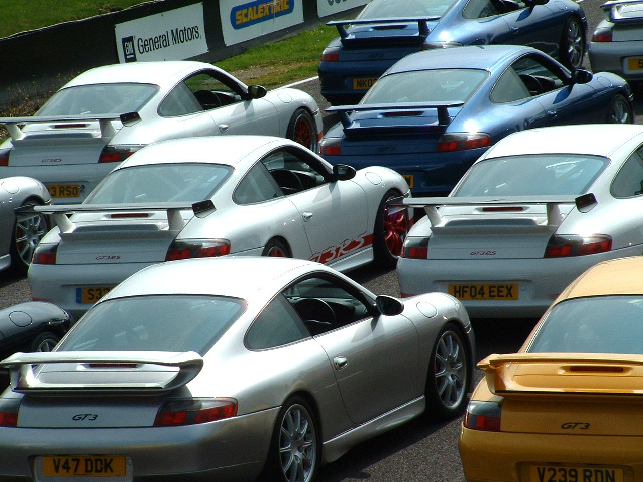 a lot of small cars parked in the lot