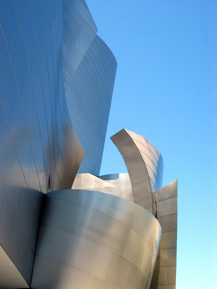 a sculpture on a building in an architectural design