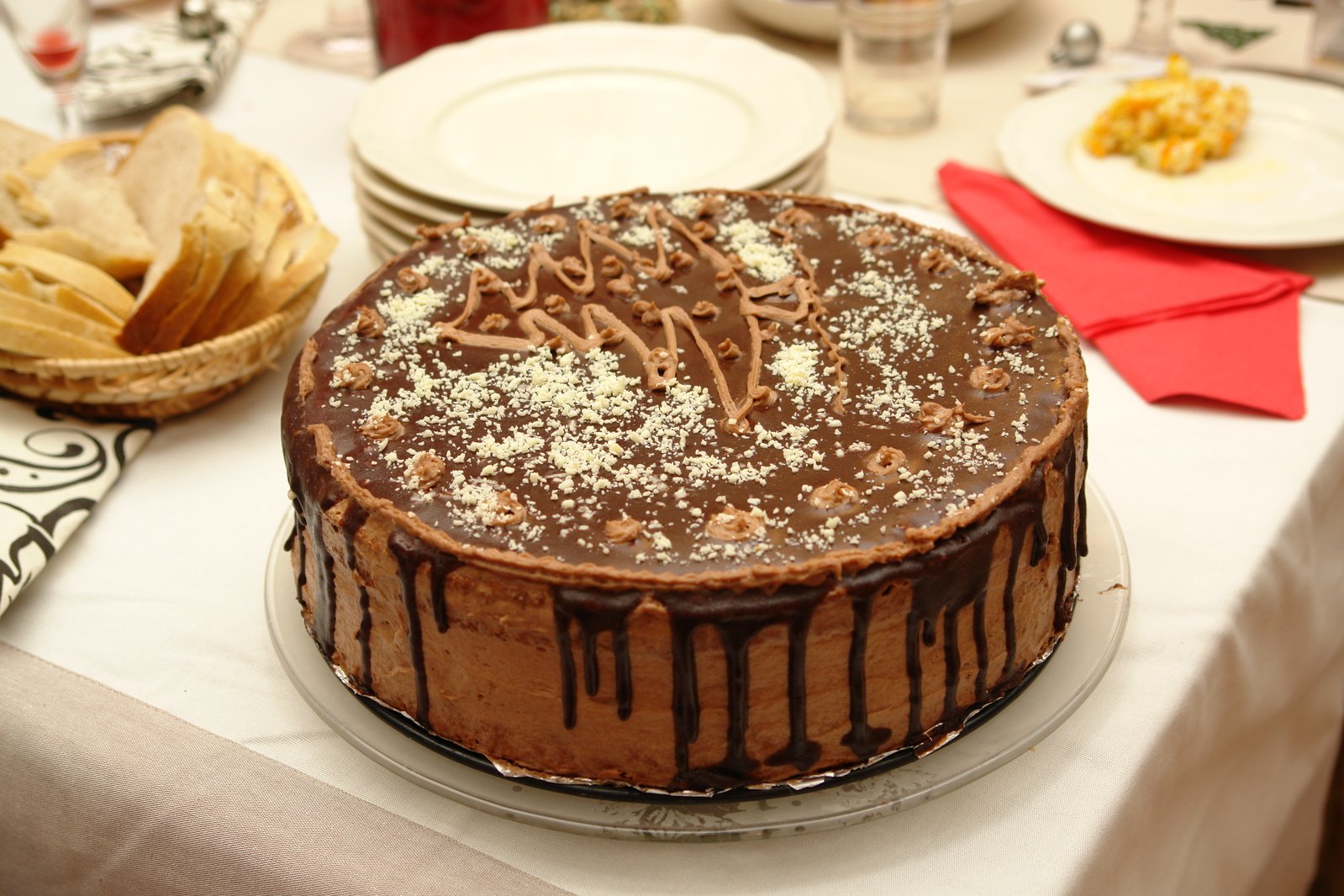 a cake with a chocolate frosting and brown frosting on it