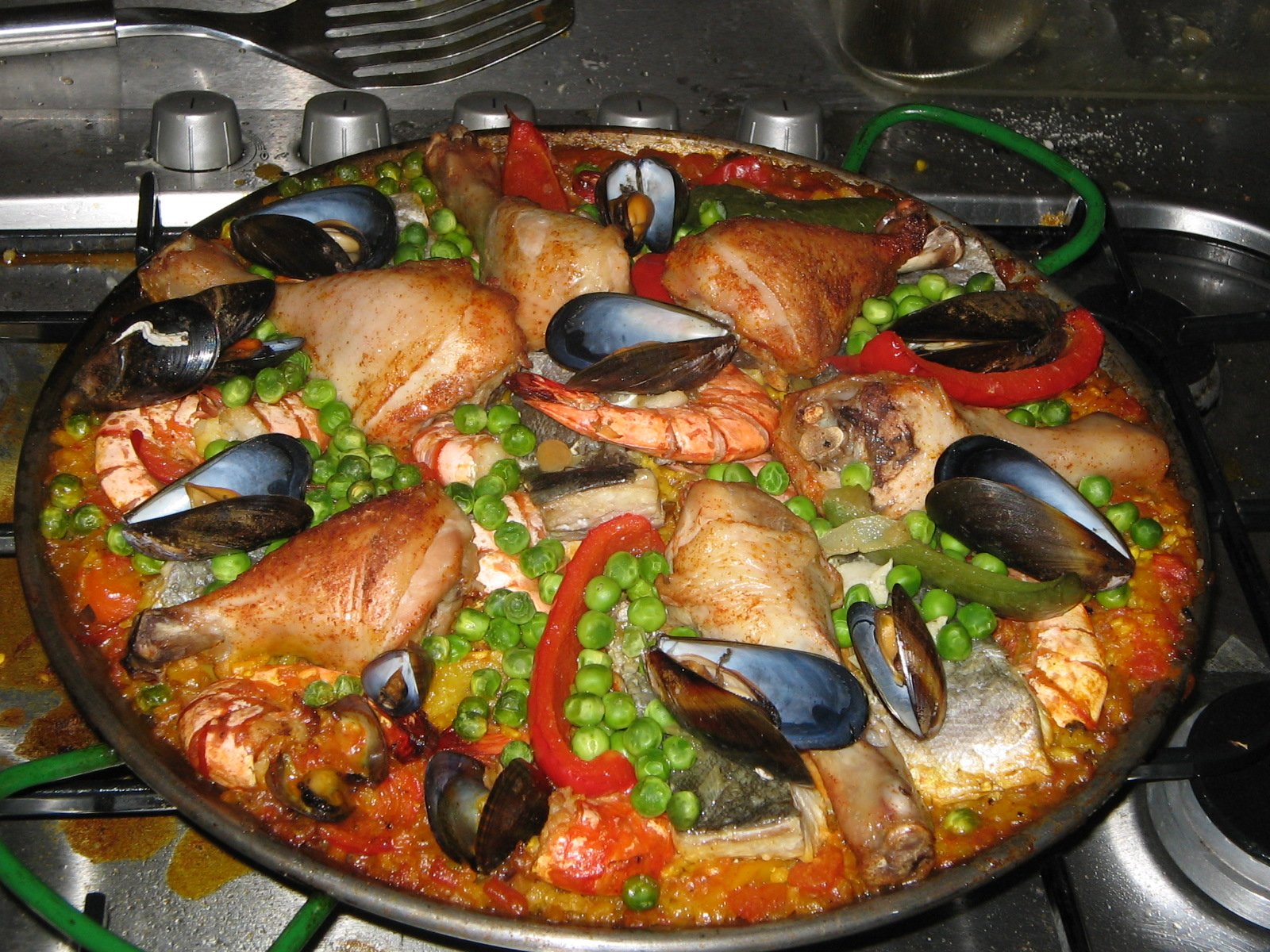 a dish is displayed on the stove cooking