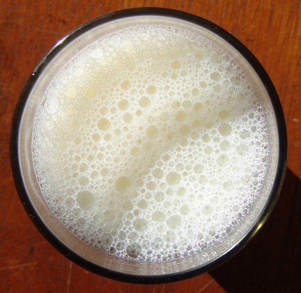 an overhead view of a drink in a blender