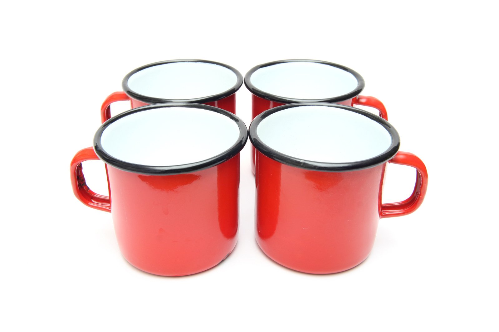 four red coffee cups with black trims