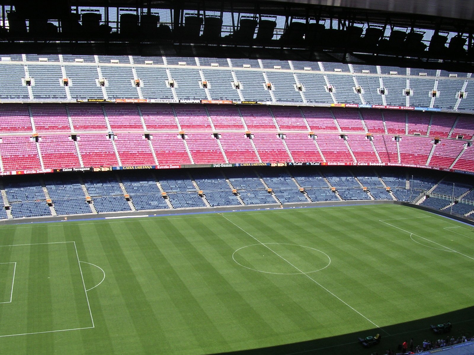 the stadium seating is empty as many people are in it