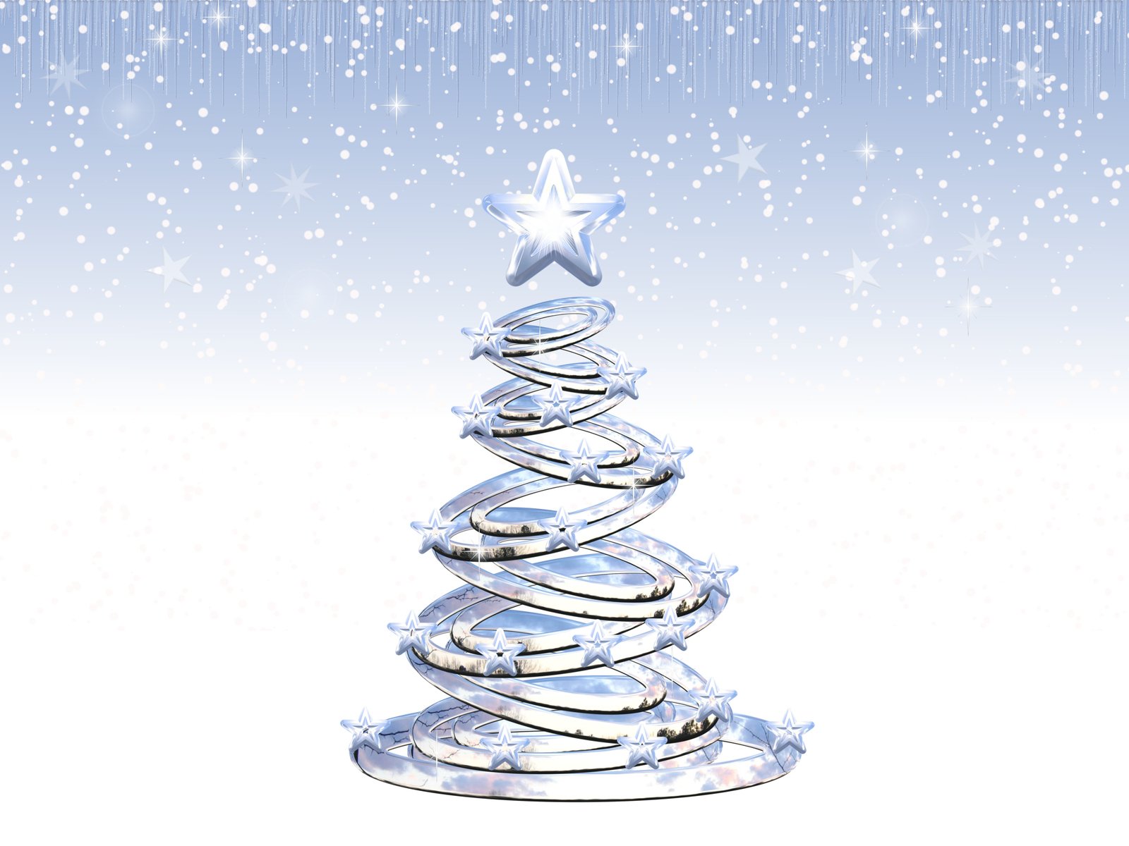 a shiny silver christmas tree with a star on top