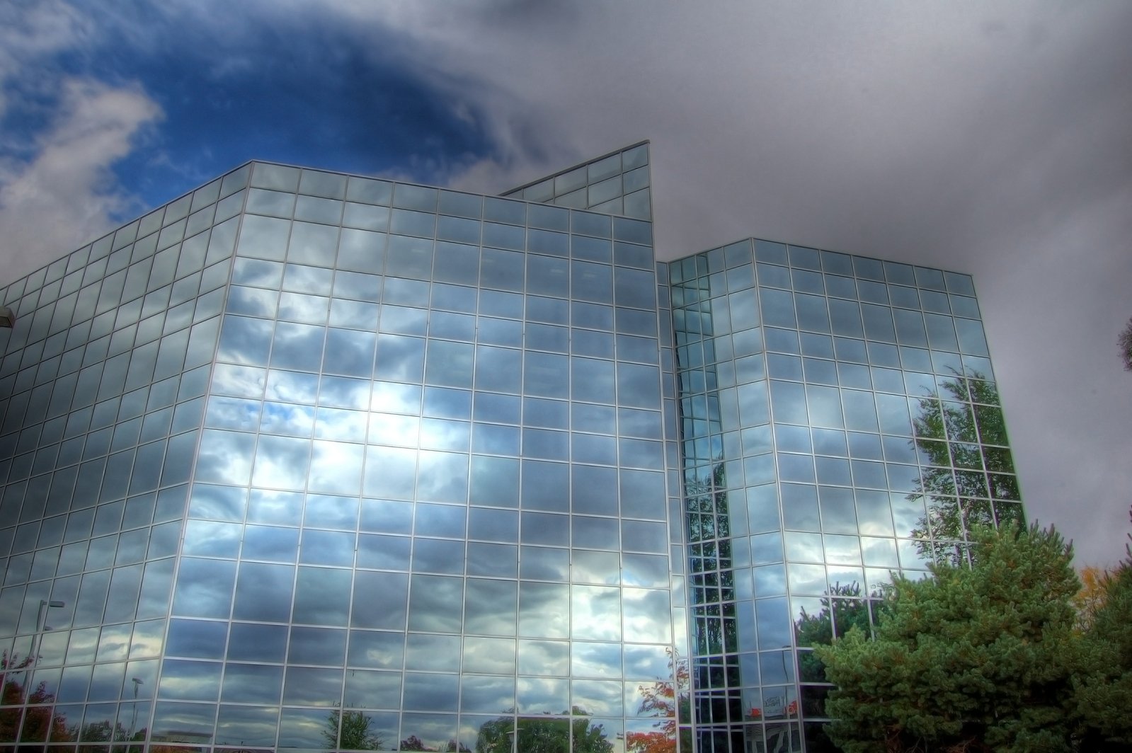 very high up in the image and the reflection of sky