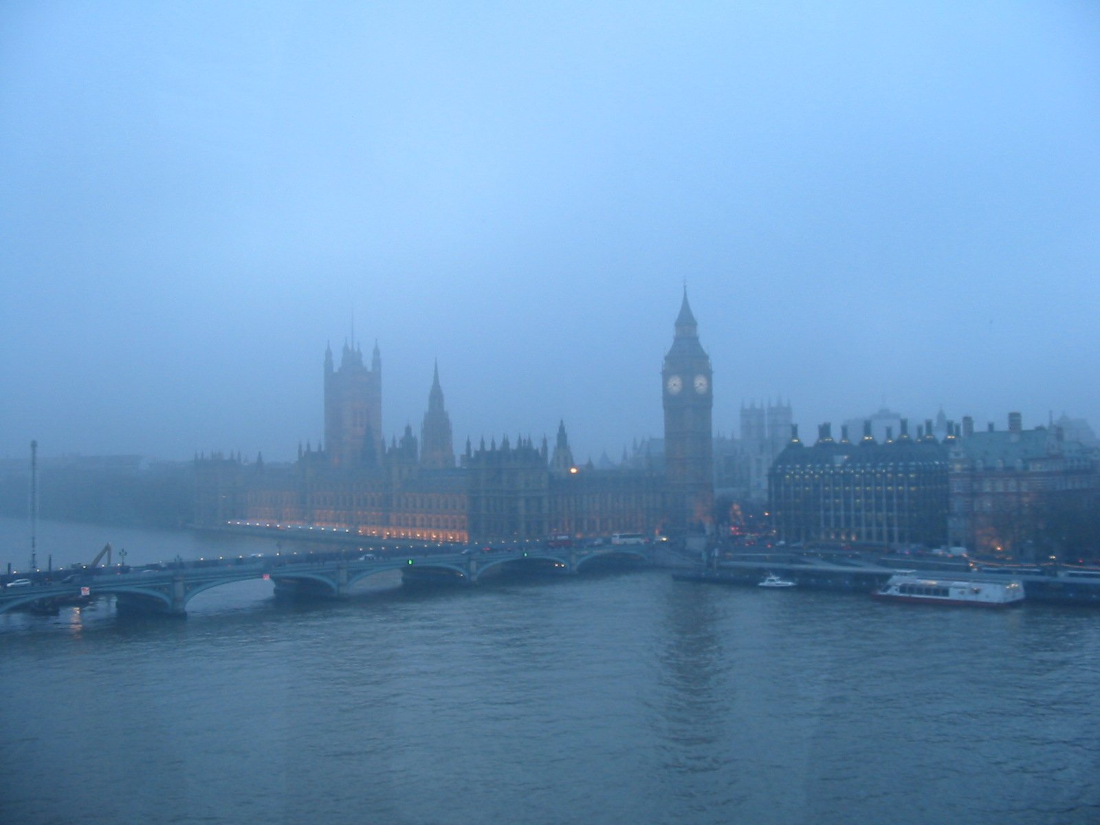 a foggy night on the thames near london