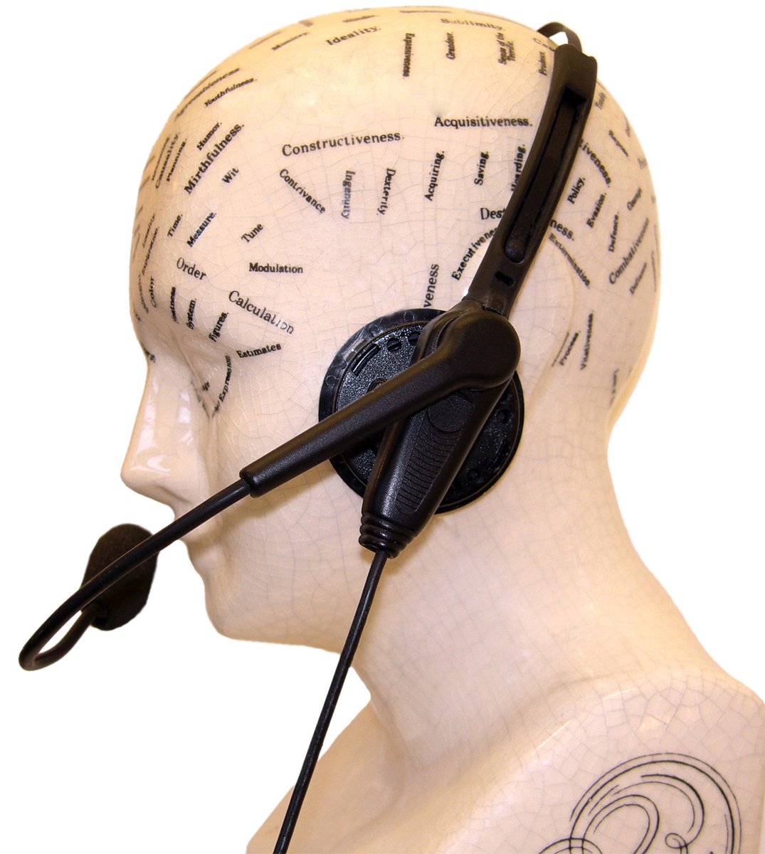 a mannequin's head with the words on it and a microphone in its ear