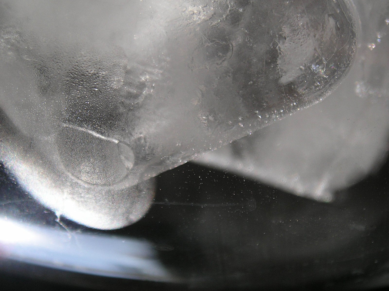 this is a close up s of a glass cup with boiling substance