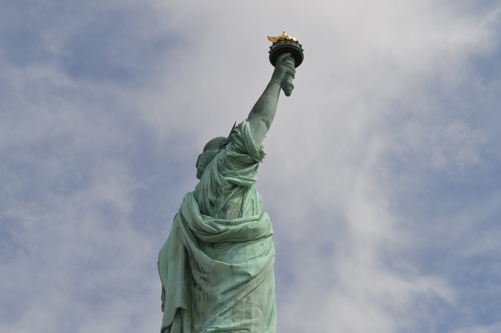 the statue of liberty is the subject of the sky