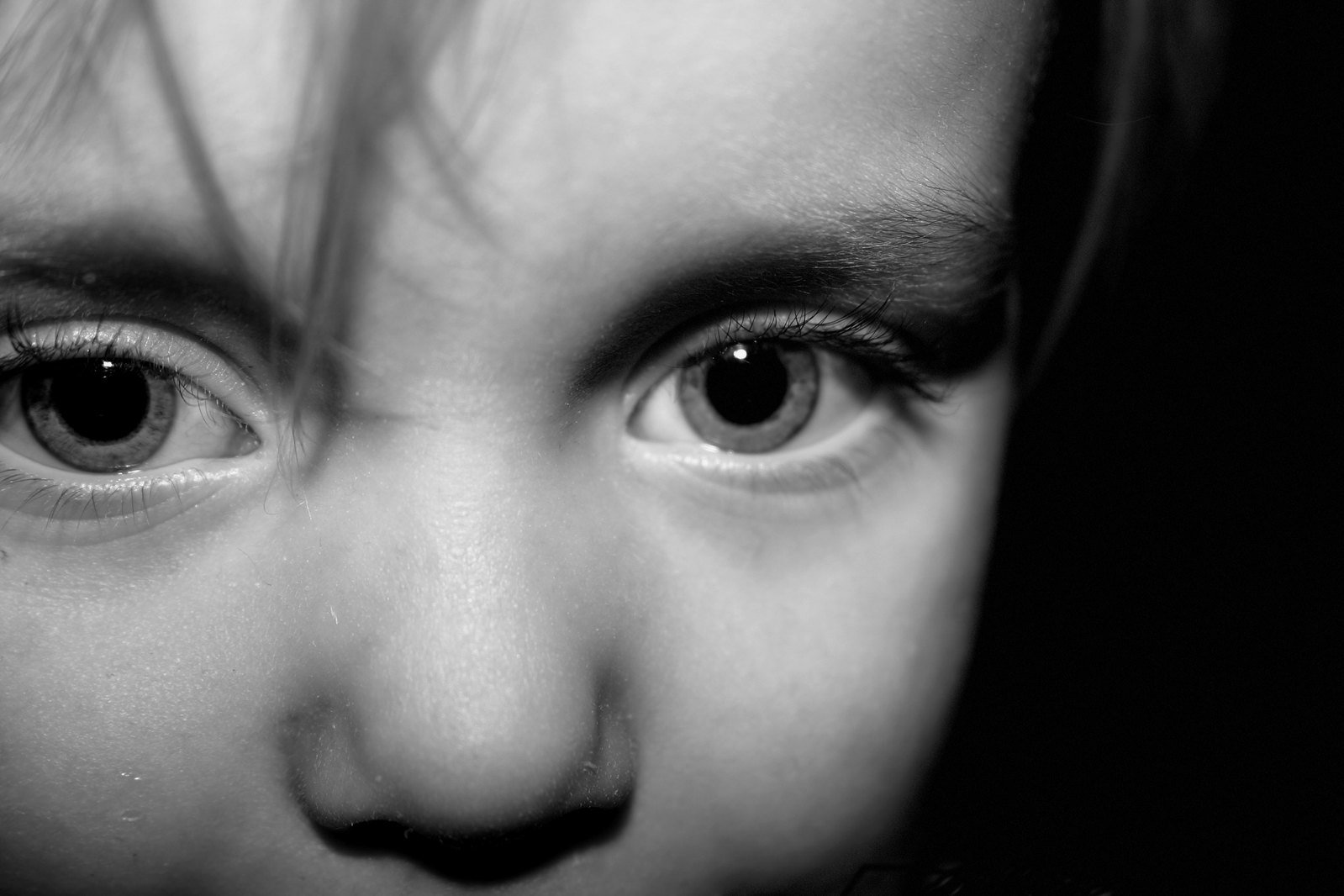 closeup of a child's face, with the eyes looking at you