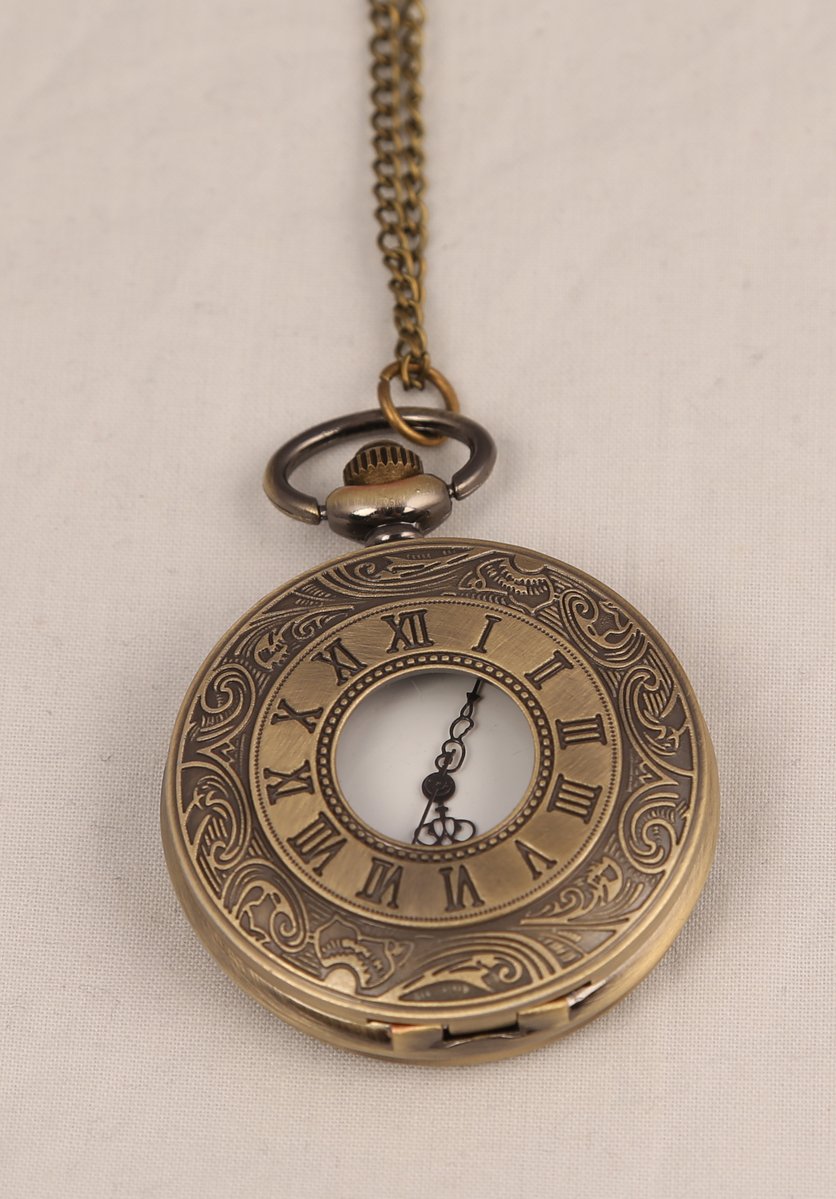 an antique gold pocket watch with chain and key