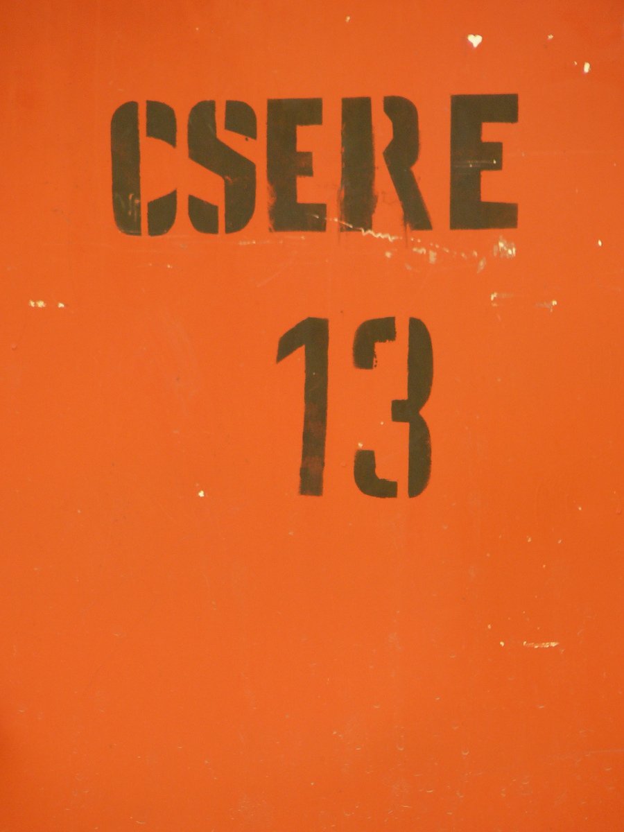 an orange box with black numbers on it