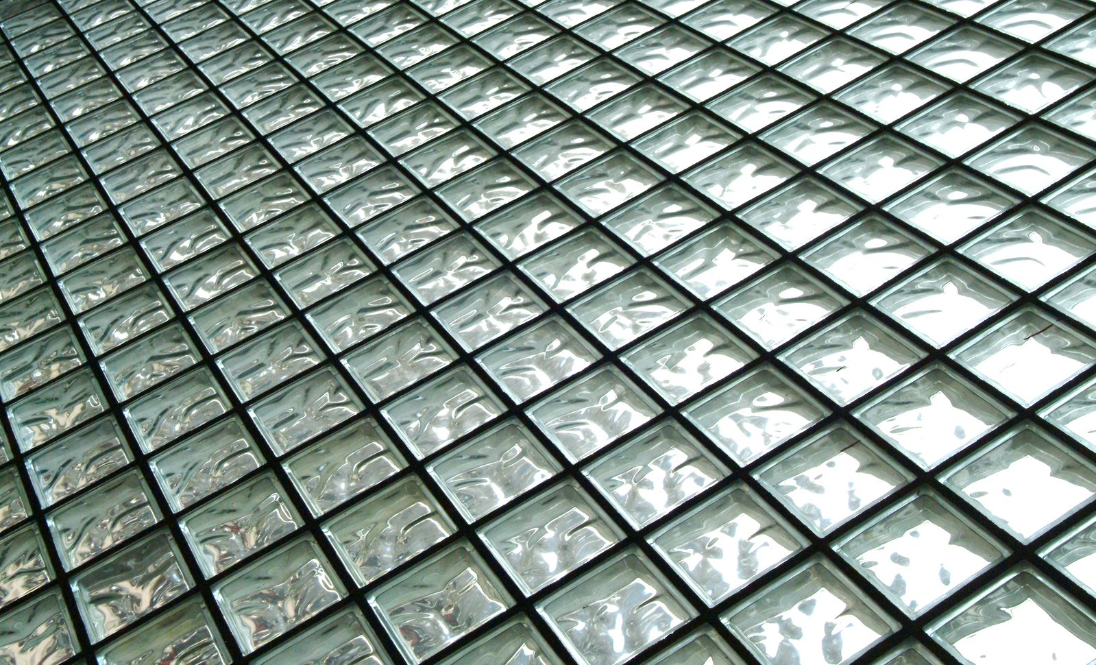 a closeup view of a glass and aluminum mosaic