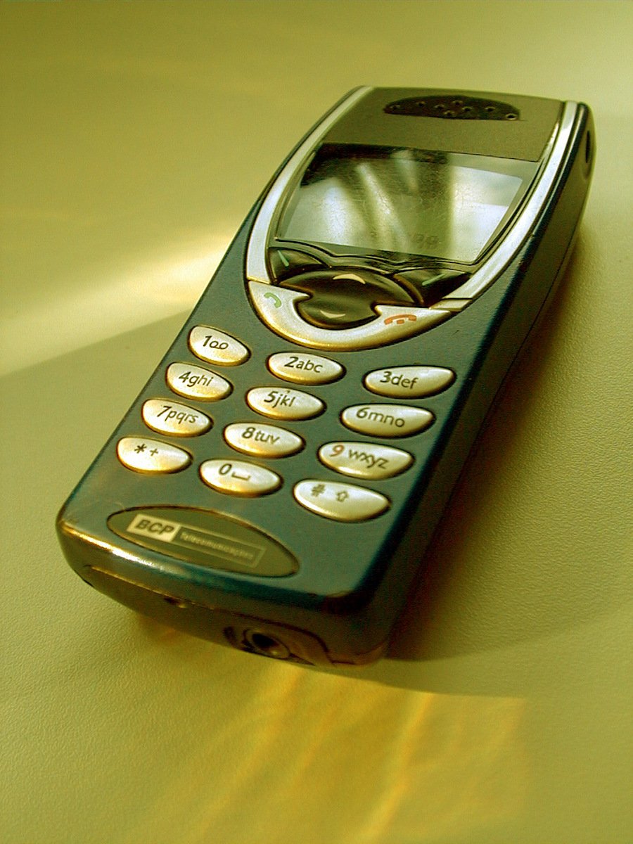 a nokia cell phone laying on the surface