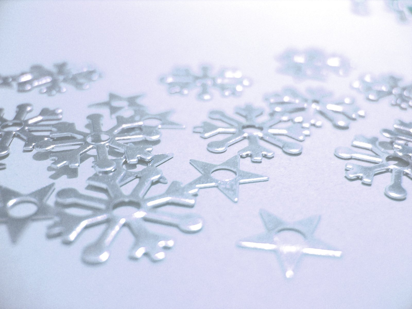 snowflakes made out of various shiny metal objects