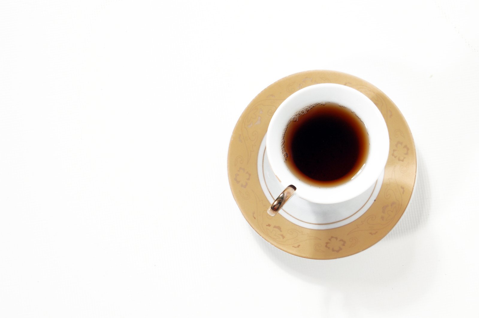 an overhead view of a cup of coffee