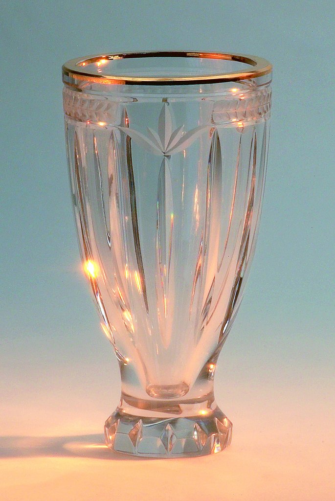 an upside down view of an elaborate glass cup with lights inside
