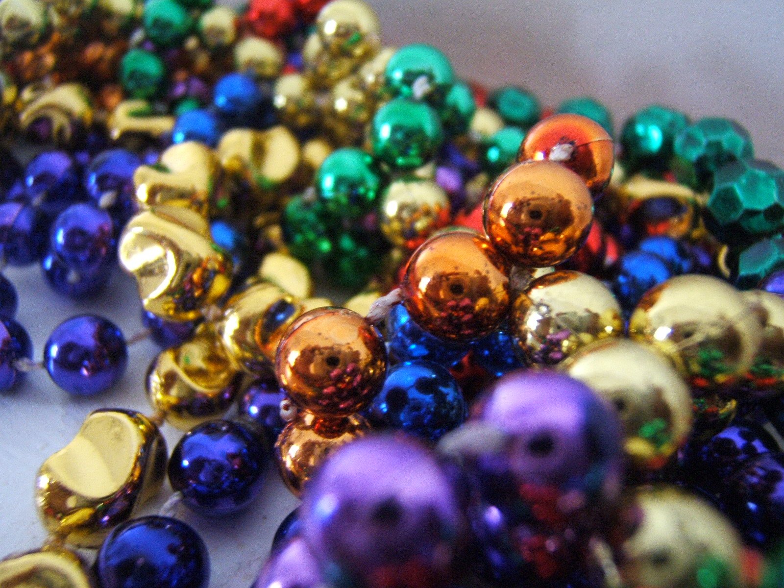 several colorful beads laying on the table