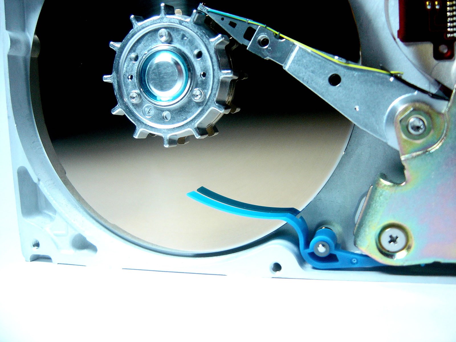 a close up of two open pieces of a hard drive