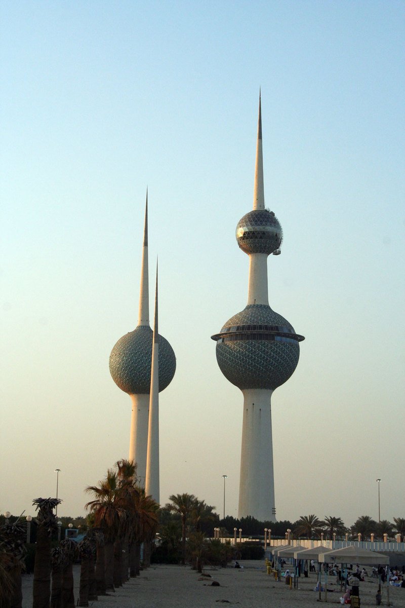 two tall buildings with domes and spires