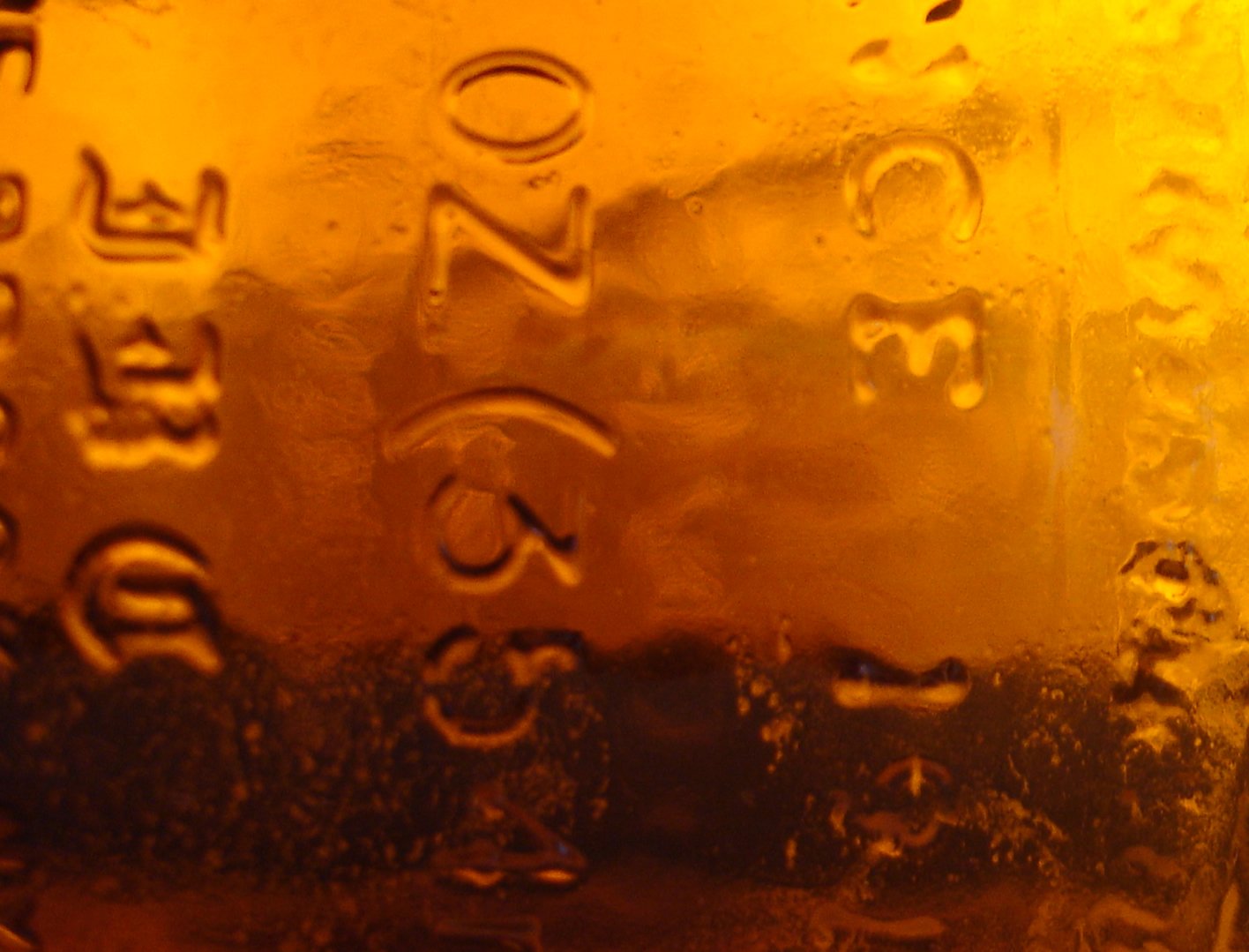 close up of glass with the word crazy written on it