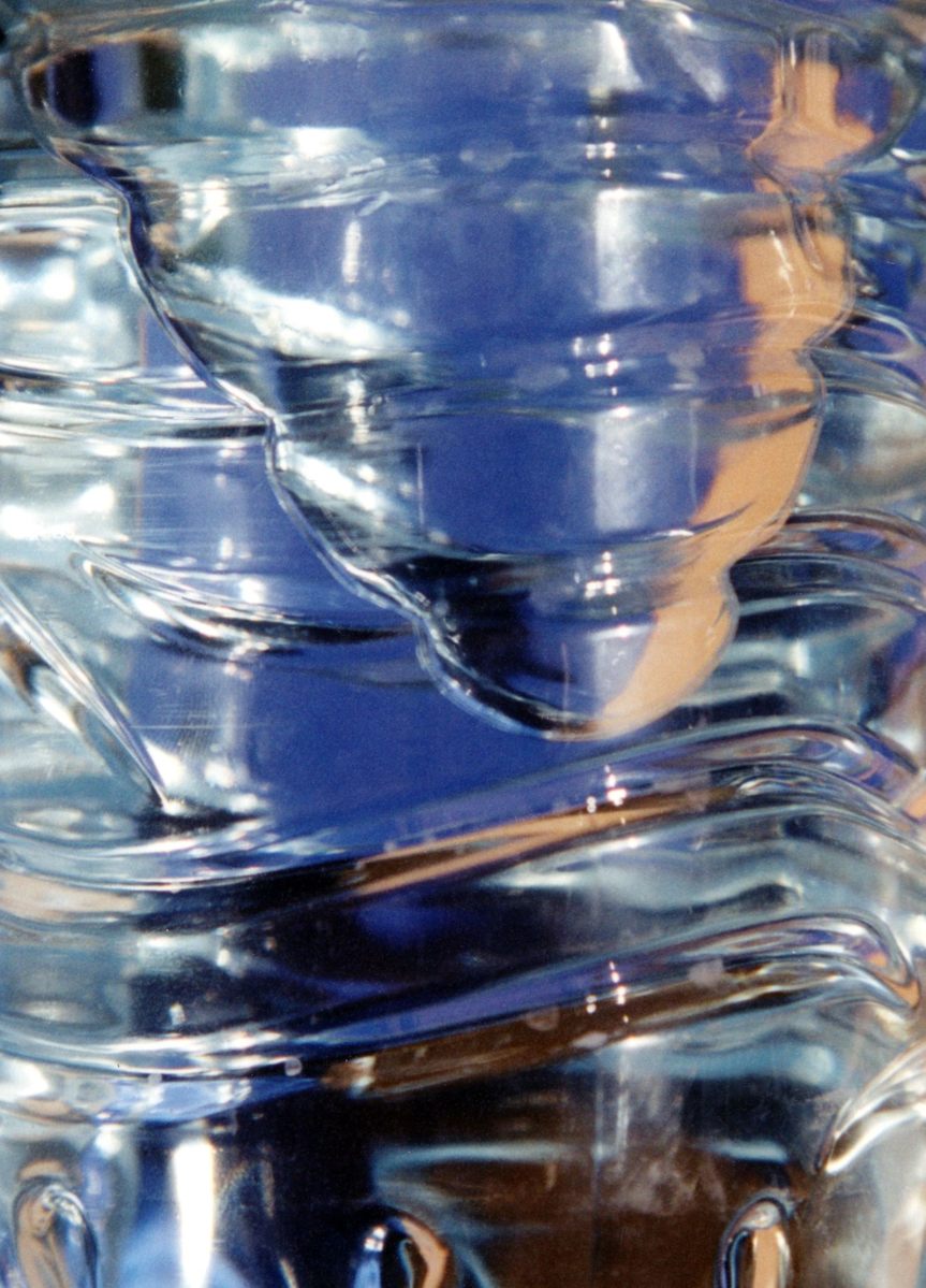 a close up image of glass cups and pitchers