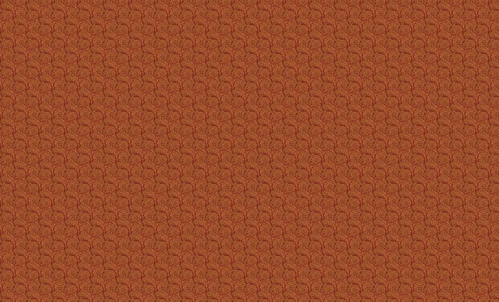 an orange colored background with a design in red