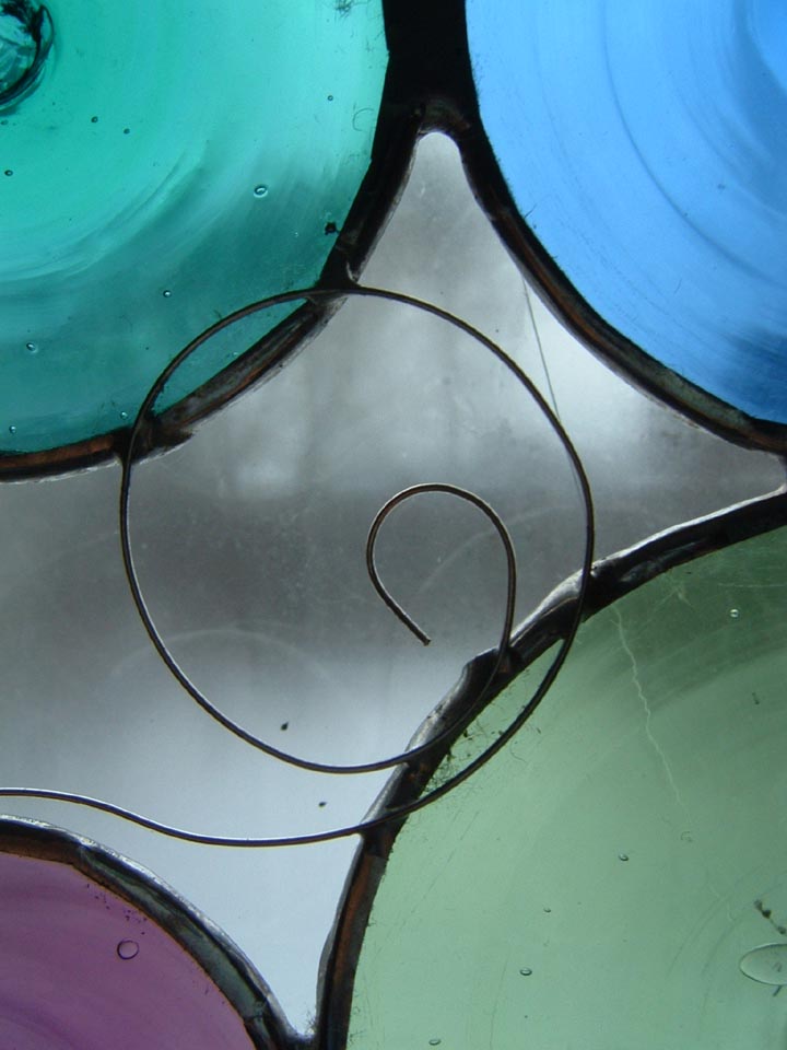 a close up view of colored glass material