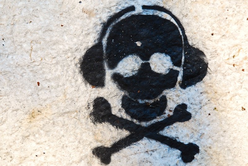 a skull and crossbones is shown in black on white