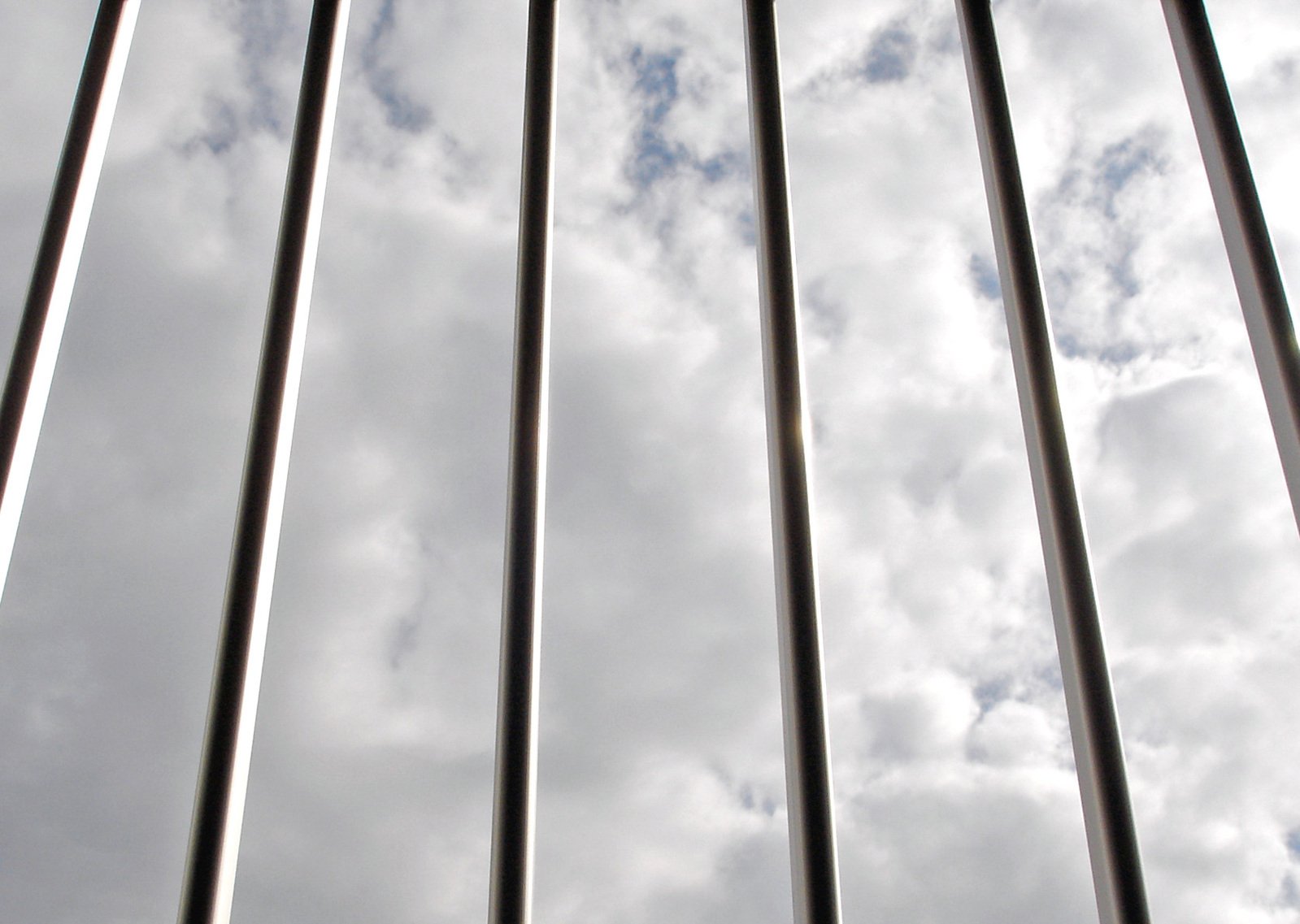 four tall poles reaching up into the sky