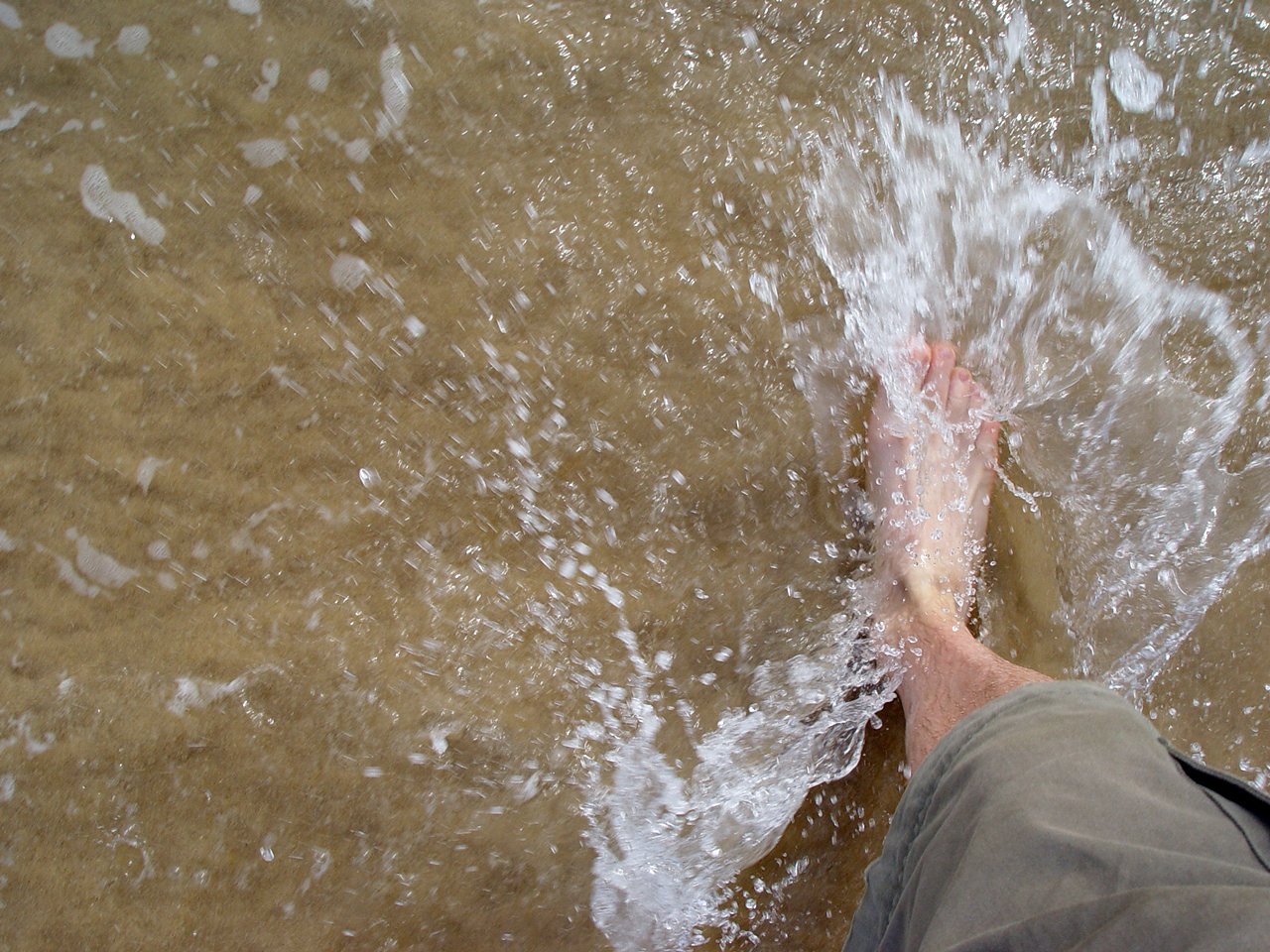 the feet and feet of a person who is on water