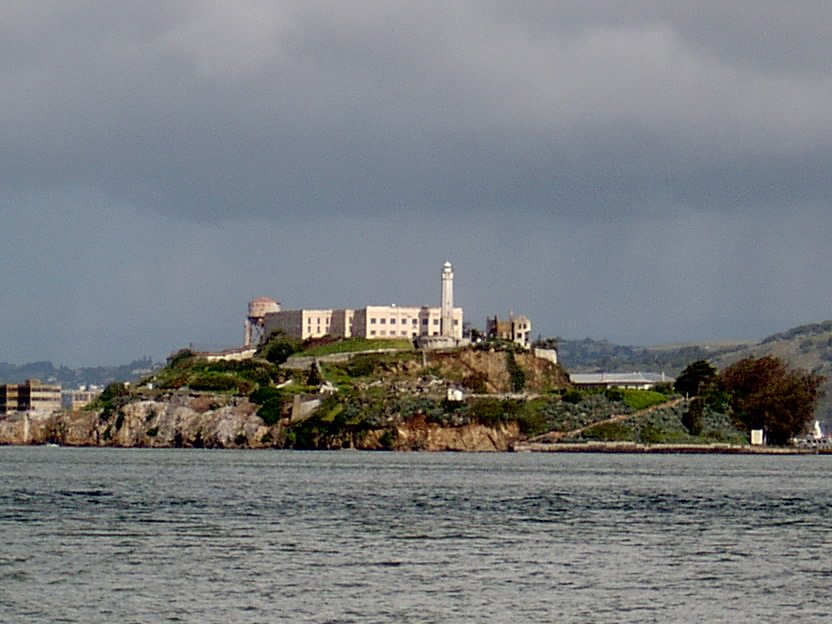 a white building is on a small island