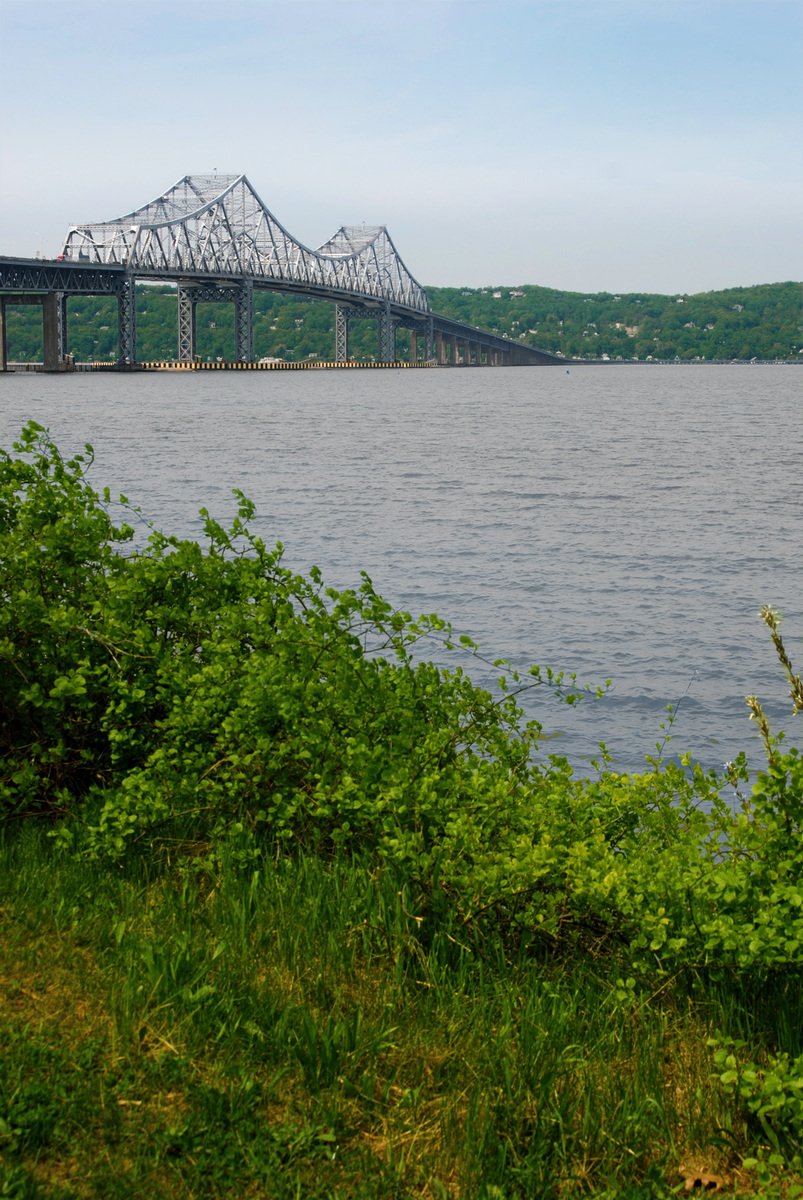 a long bridge over a wide body of water