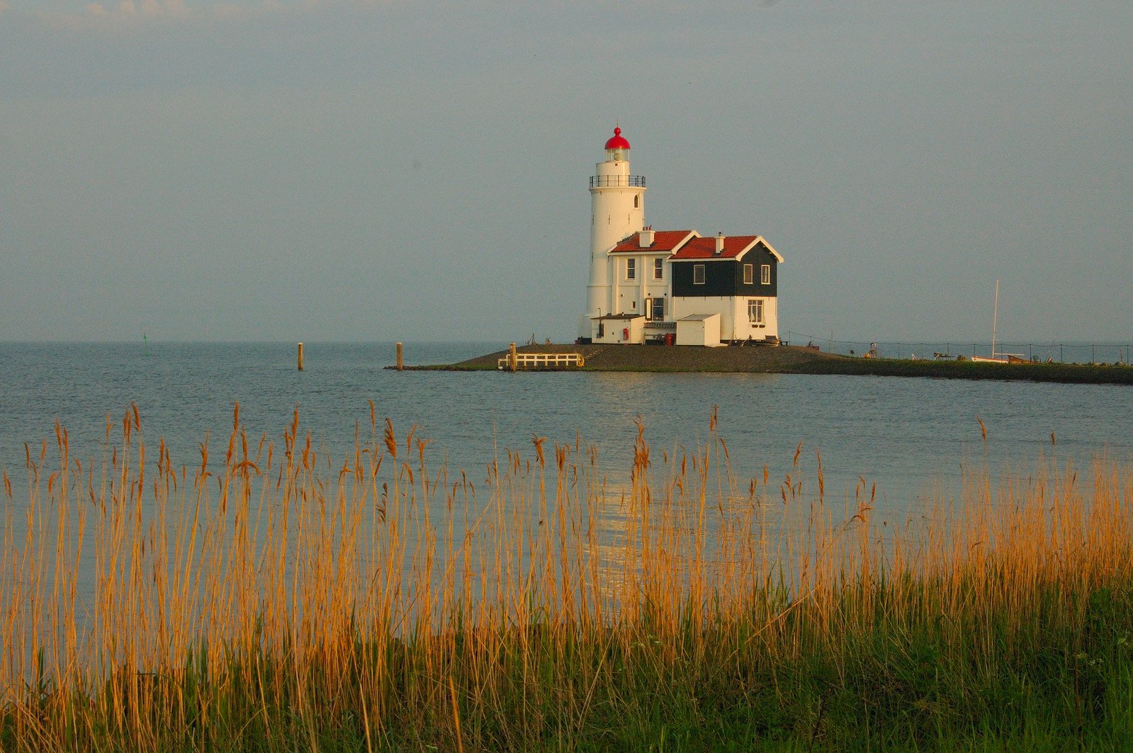 an image of the lighthouse that is out in the water