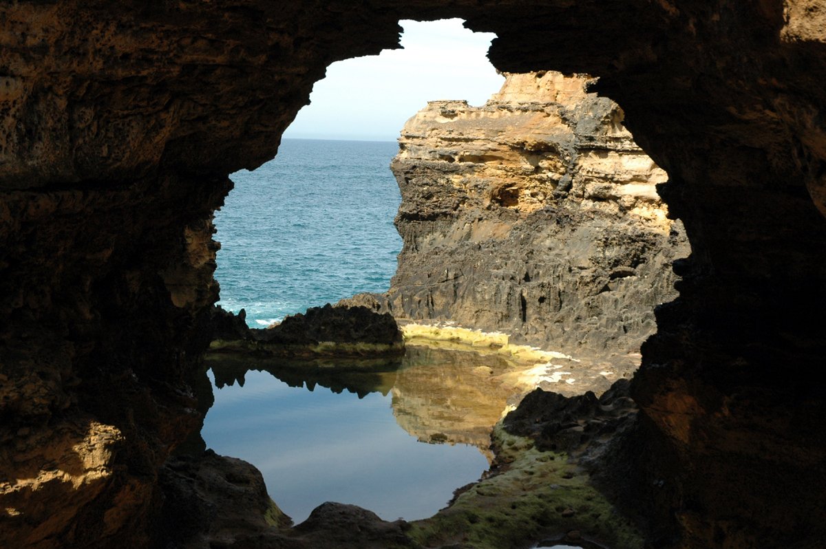 a lake surrounded by rocks and water