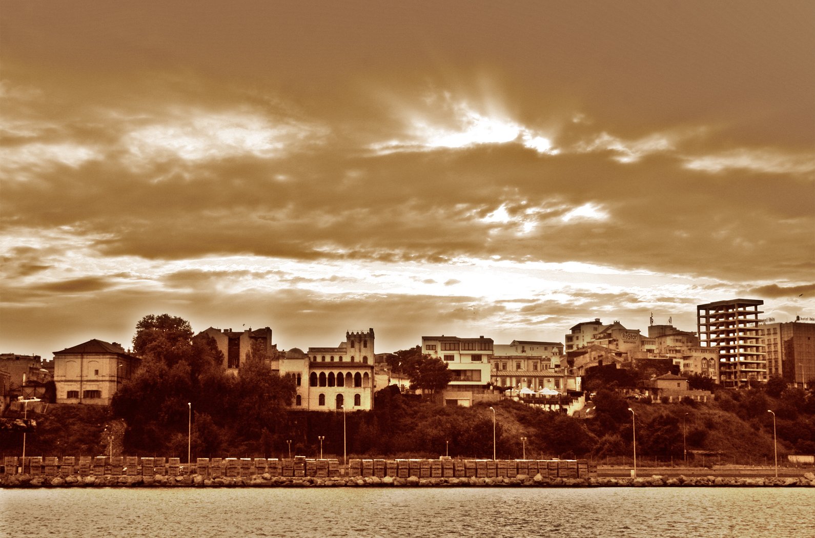 a black and white pograph of the skyline of buildings