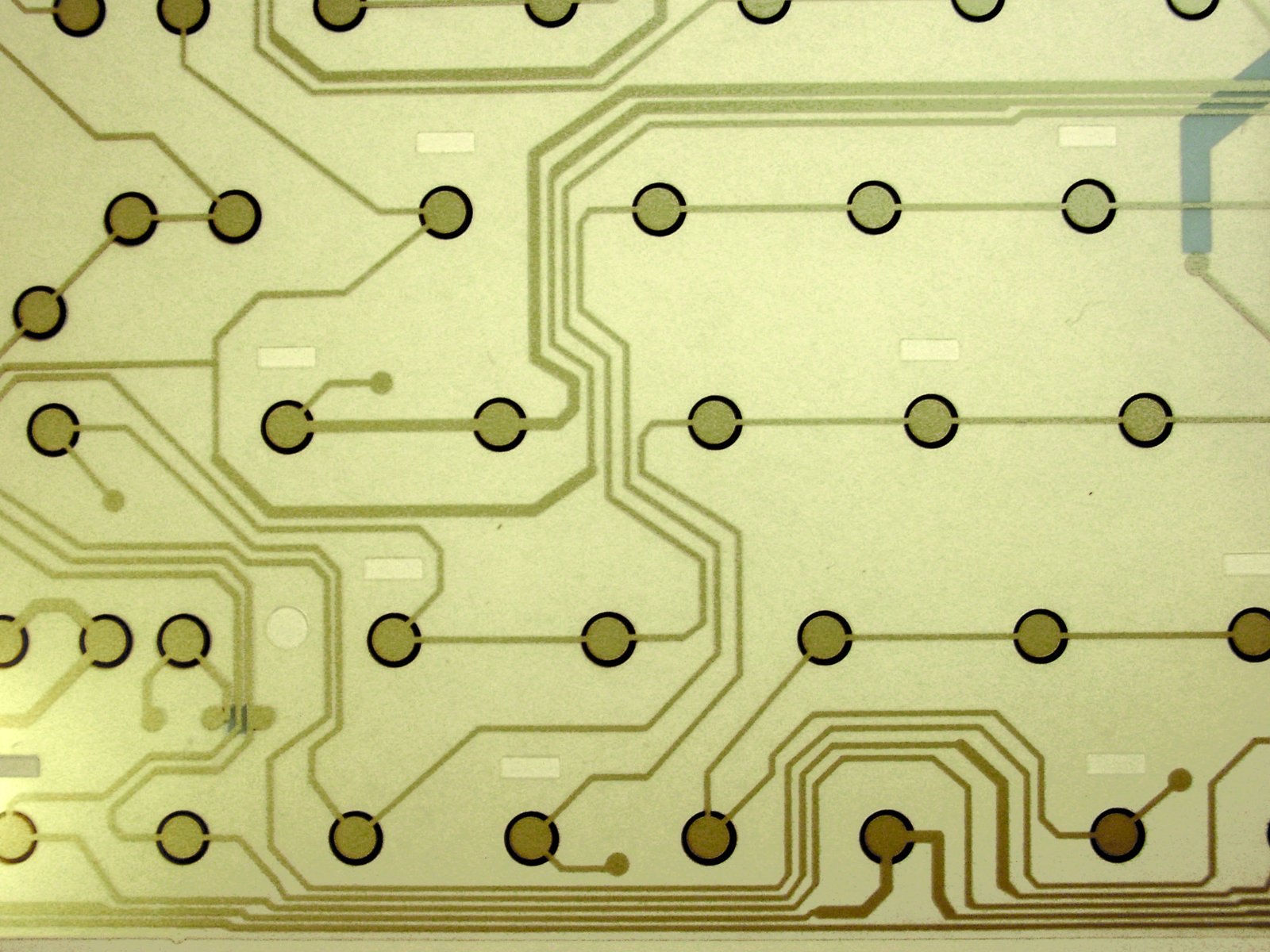 a printed circuit board with lots of small holes