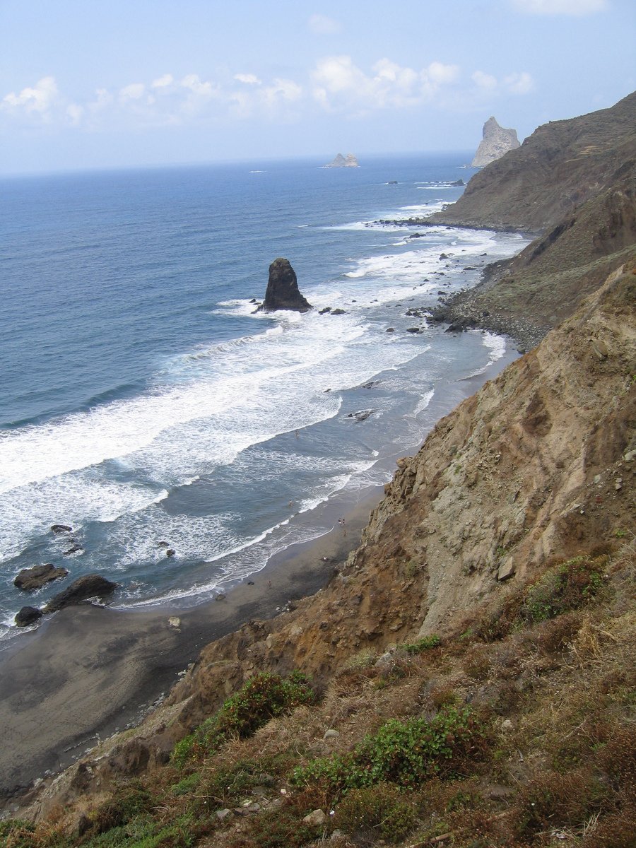 the ocean sits on the hillside and has a view