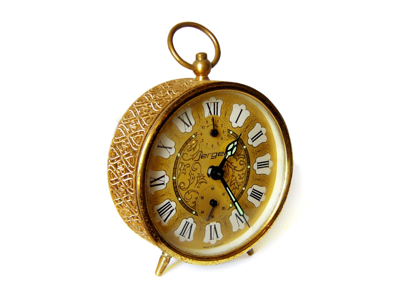 the small yellow clock is shown with gold dial