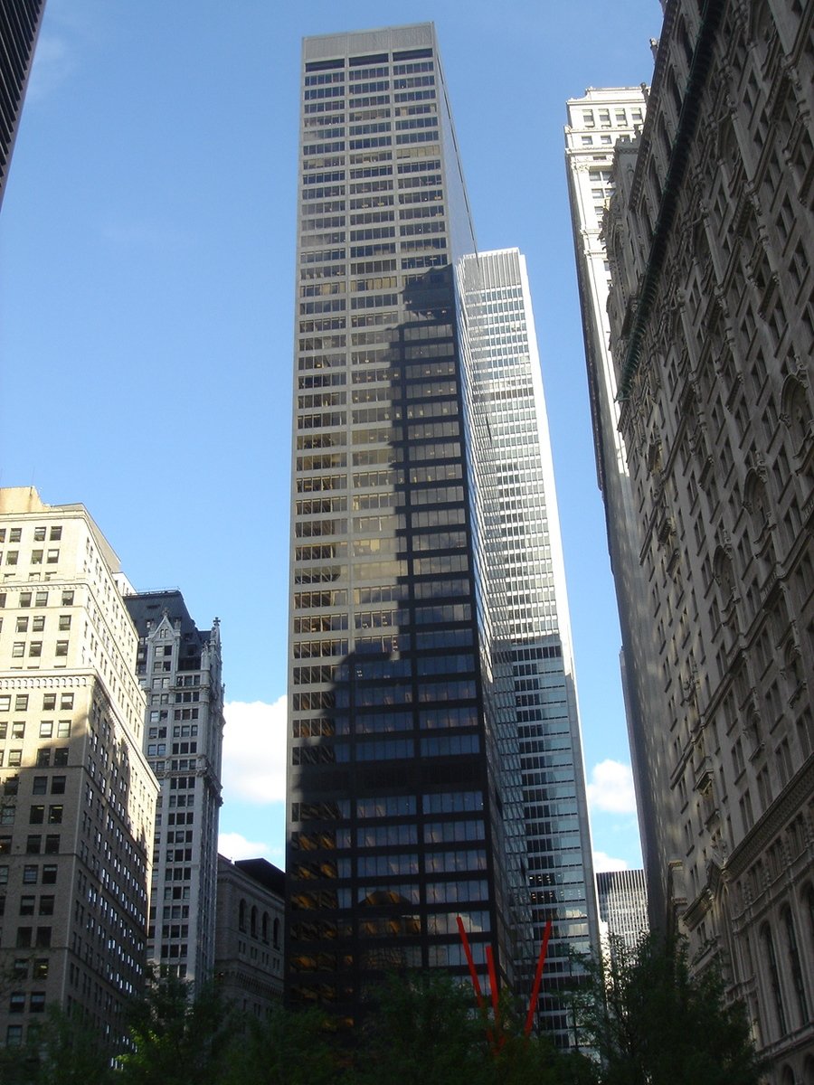 a number of tall buildings next to each other
