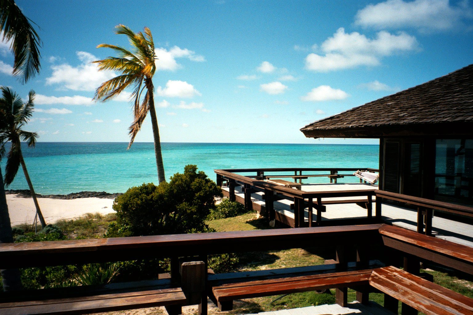 the beach front porch area looks out into the ocean