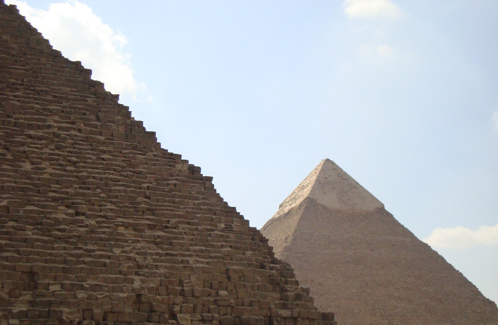 the pyramid and its massive brick wall in egypt
