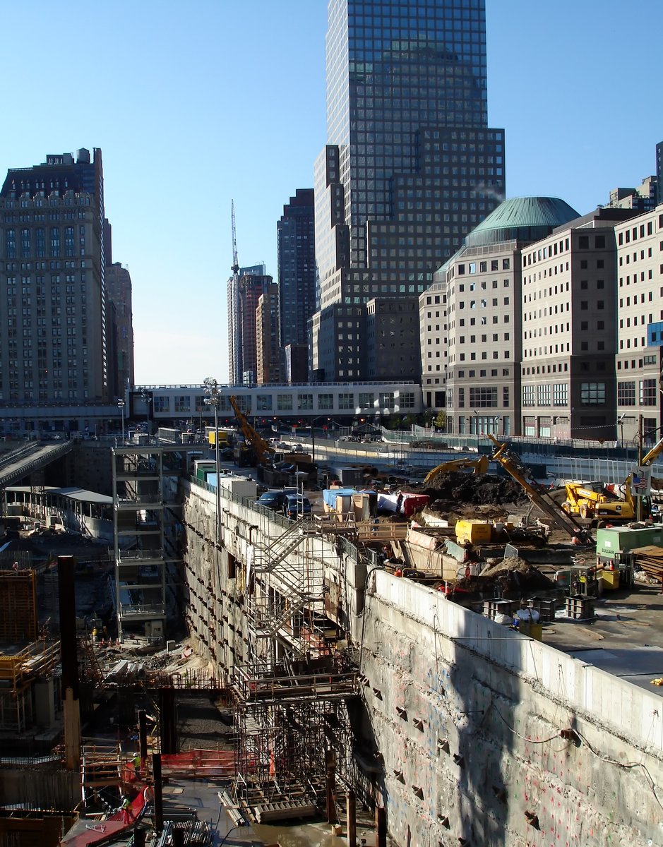 the view of a city construction site looking across the road