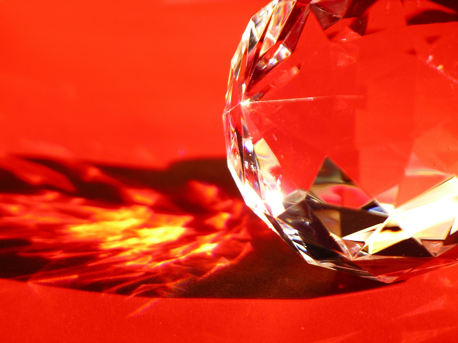 red glass object sitting in the sun light