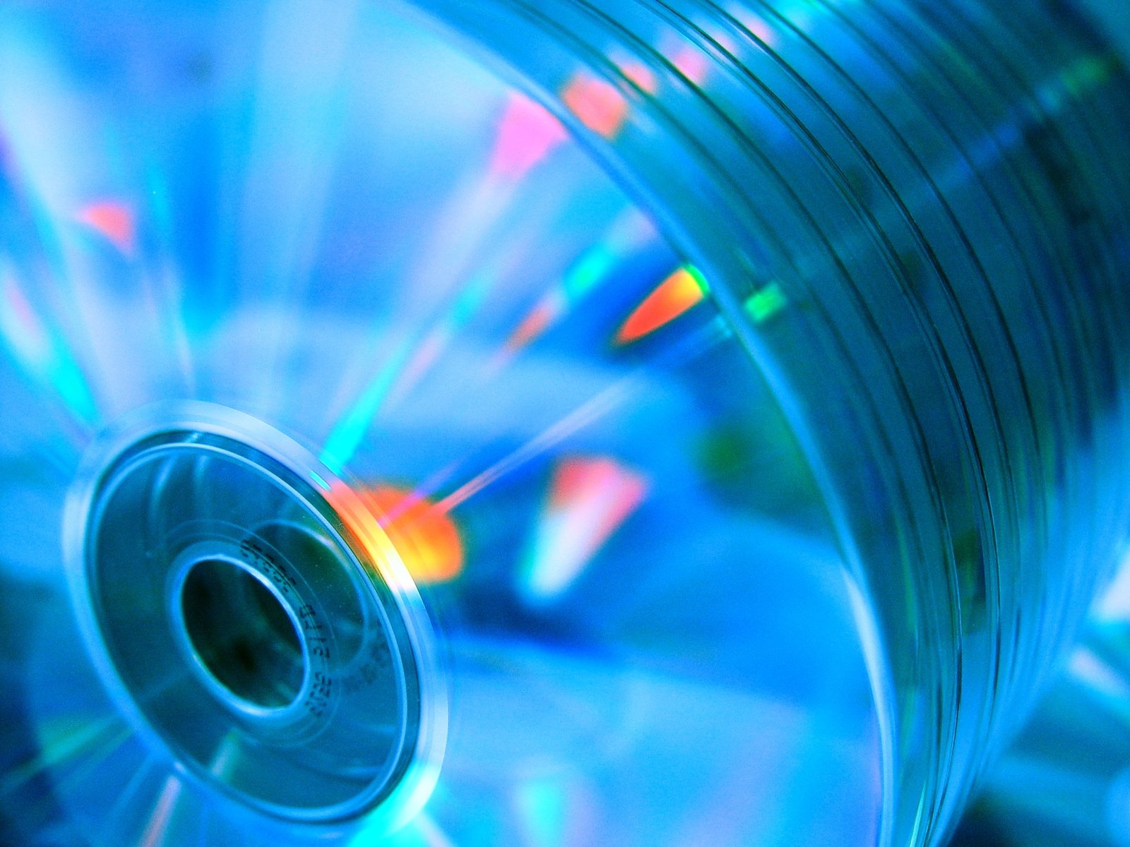 a cd disk with an abstract blue glow