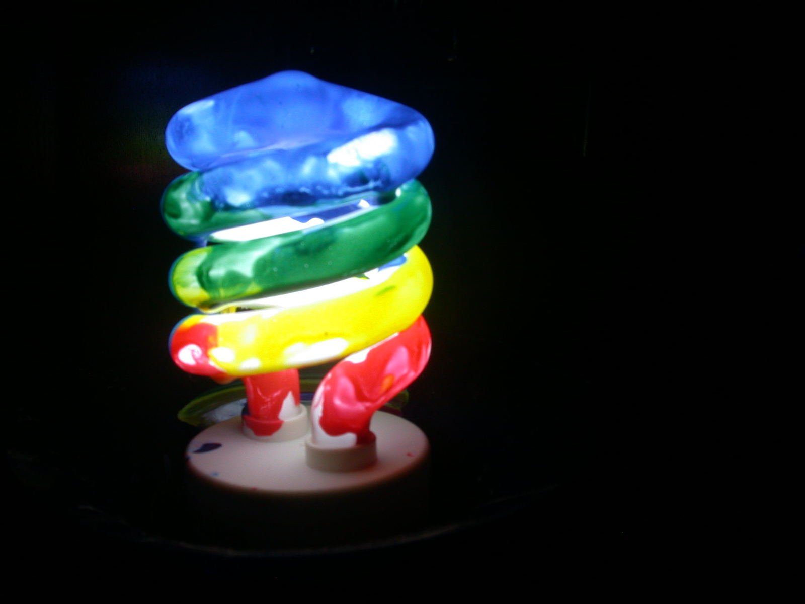 a small lit toy is shown at night