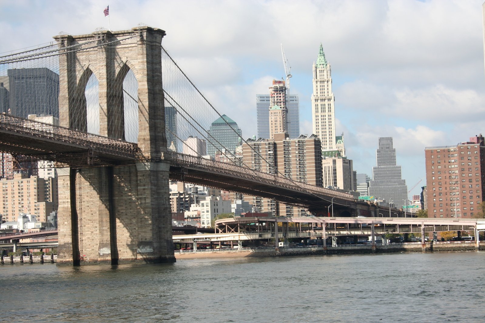 a bridge is shown as the skyline is in the background