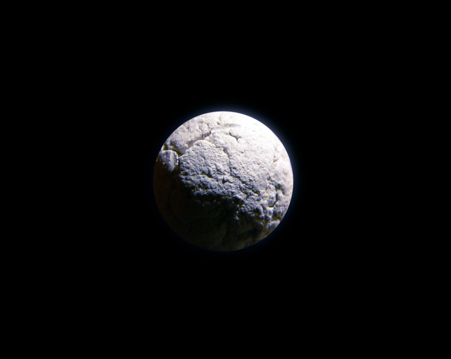 a large rock is in the darkness with a dark sky behind it