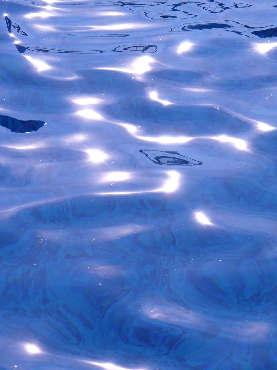 water ripples down on a rippled surface