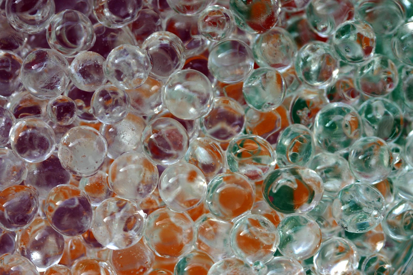 a large amount of bubbles that look like they have colorful colors